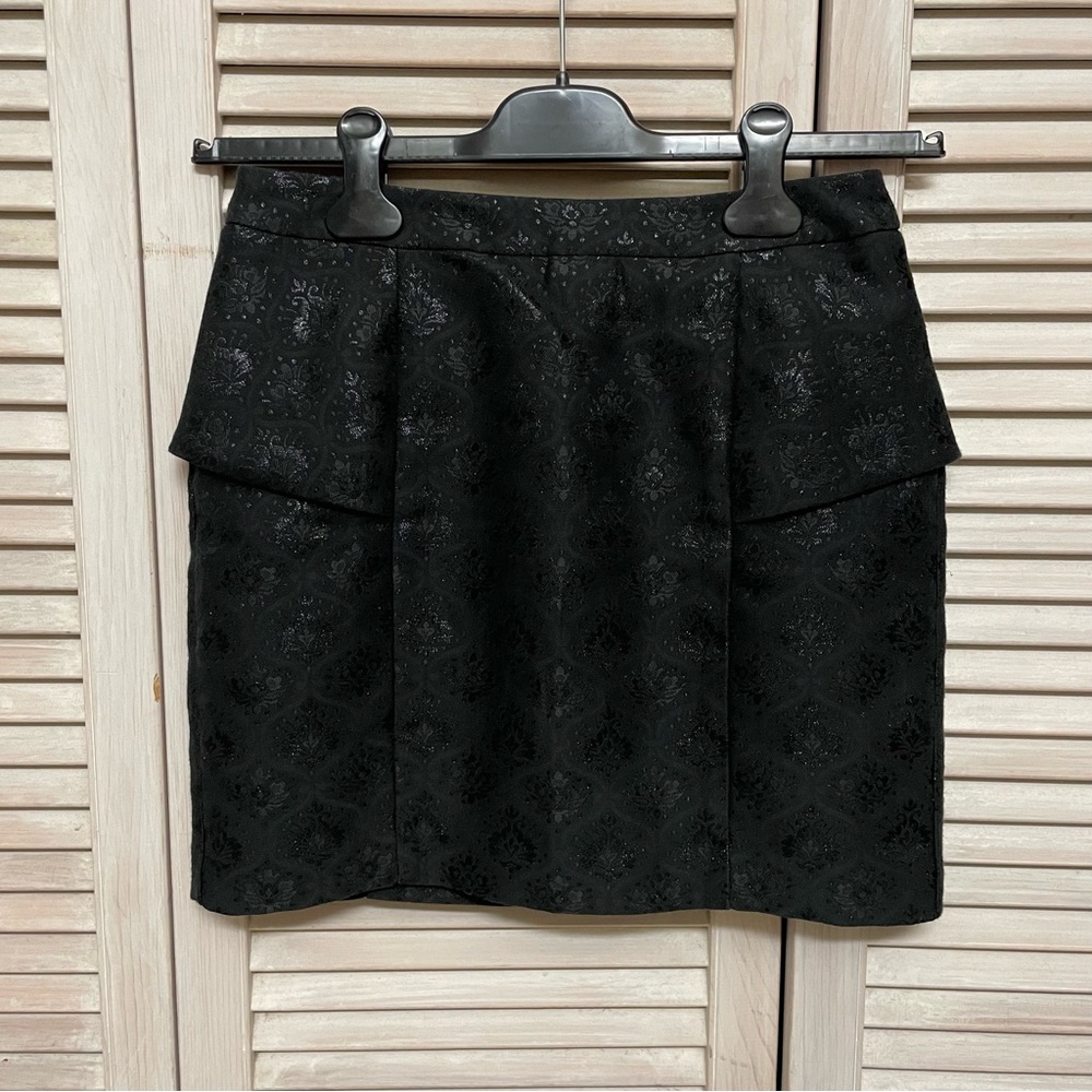 Shiny black mini skirt from Korea size small.